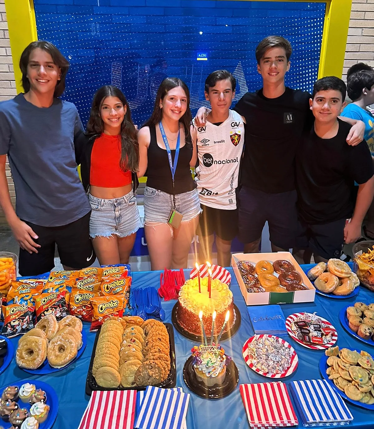 A party table of cake, snacks and pastries at an ELC evening event in the residence halls