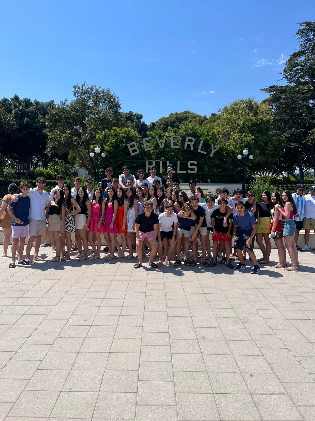 A large group of ELC students at the Beverly Hills sign in Los Angeles