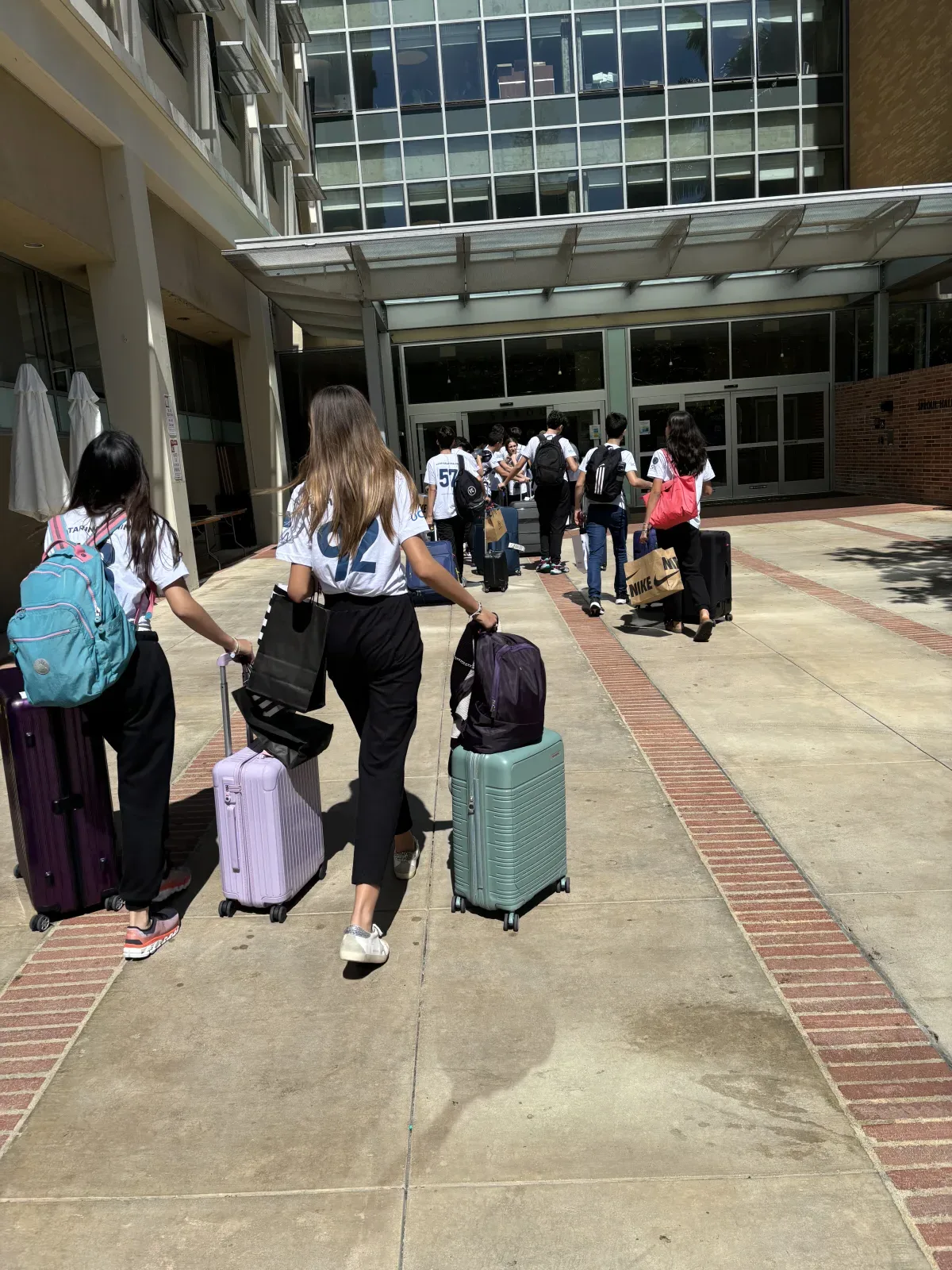 Students arriving with their luggage for move-in at the UCLA residence halls